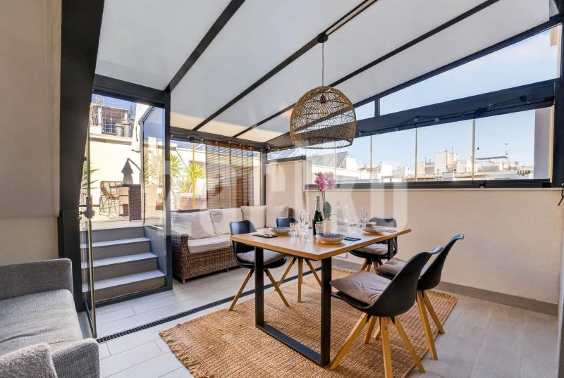 A modern penthouse with four balconies in the city center
